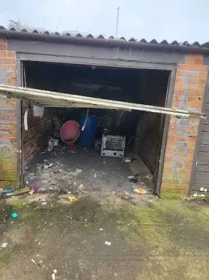 House Clearance Huddersfield Halifax Leeds - a garage packed with items before clearance