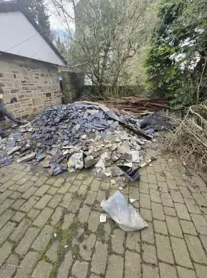 Waste Removal Huddersfield Halifax Leeds - builders rubble stacked ready for collection