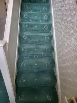 House Decluttering Services Huddersfield Halifax Leeds - a staircase cleared and carpet cleaned